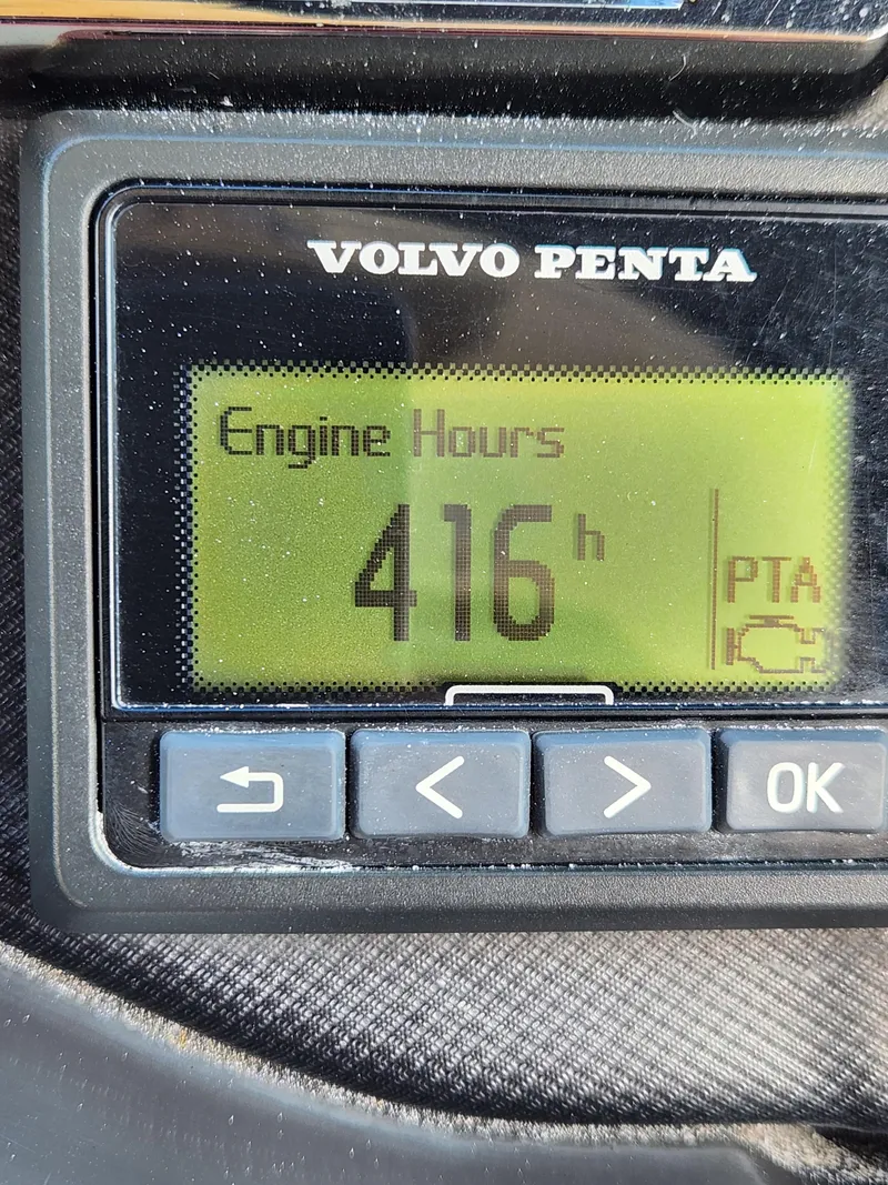 Slide: The Image of Volvo Penta engine hour meter displaying 416 hours on a 2012 Monterey 328 Super Sport. - 36