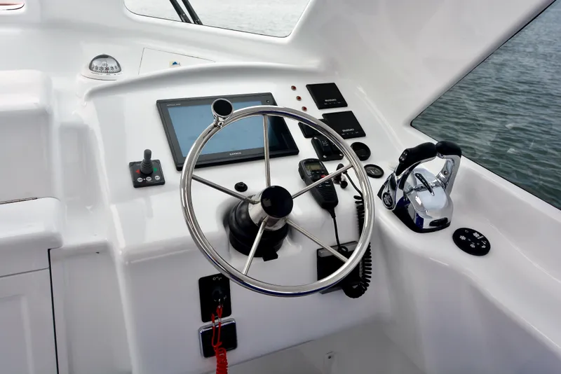 Slide: The Image of Helm station of 2018 Maverick Yachts Costa Rica 32 Custom Carolina Picnic Boat. - 11