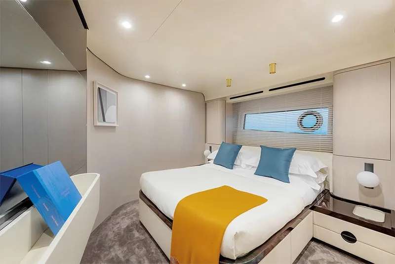 Slide: The Image of Luxurious bedroom interior of 2023 Azimut 78 yacht with modern decor. - 13