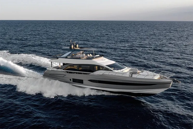 Slide: The Image of 2023 Azimut 78 yacht cruising on open water. - 3