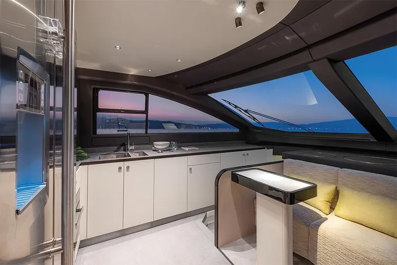 Slide: The Image of Modern kitchen interior of 2023 Azimut 78 yacht with ocean view. - 7