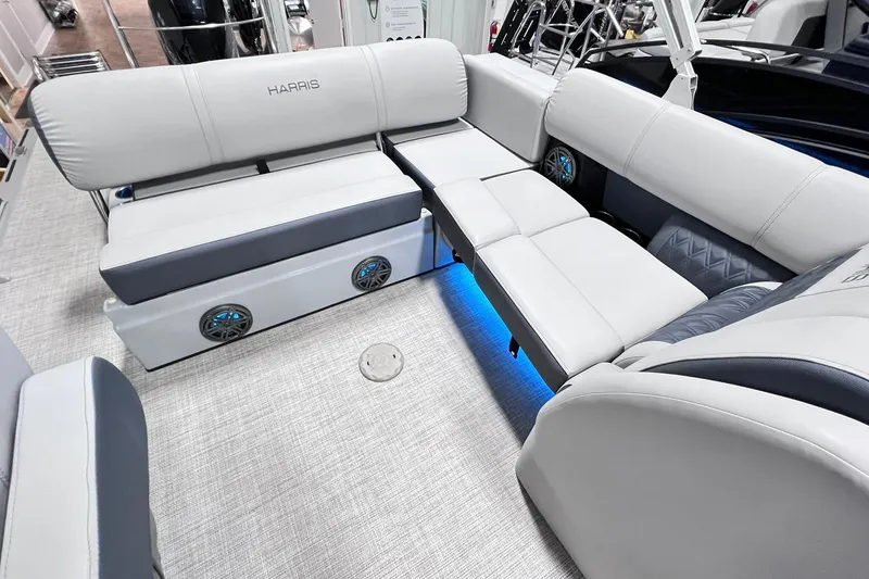 Slide: The Image of Luxurious 2022 Harris FloteBote SOLTHICE 250 interior with plush seating and ambient lighting. - 20