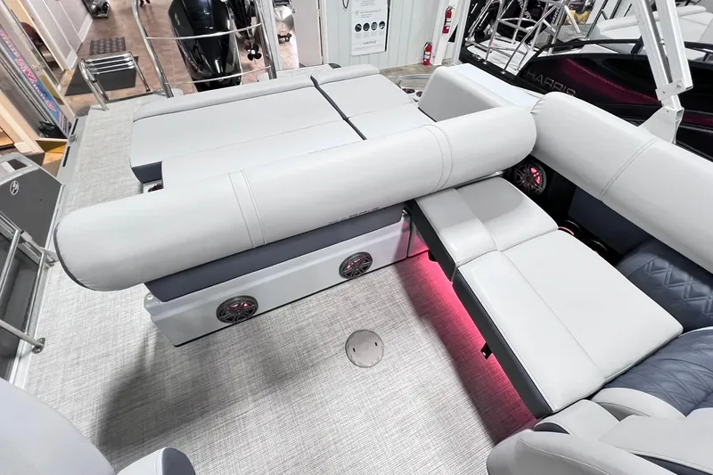Slide: The Image of 2022 Harris FloteBote SOLTHICE 250 interior with luxurious seating and ambient lighting. - 23