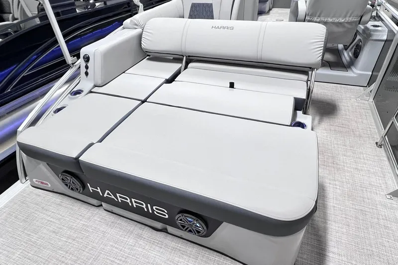 Slide: The Image of 2022 Harris FloteBote SOLTHICE 250 pontoon boat with luxurious seating and integrated speakers. - 24