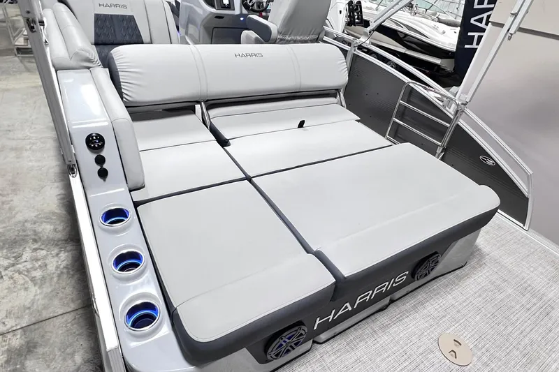 Slide: The Image of 2022 Harris FloteBote SOLTHICE 250 pontoon boat with spacious seating and cup holders. - 25