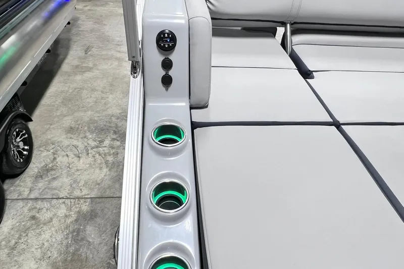 Slide: The Image of 2022 Harris FloteBote SOLTHICE 250 interior with illuminated cup holders and sleek seating. - 26