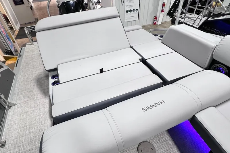 Slide: The Image of 2022 Harris FloteBote SOLTHICE 250 boat interior with luxurious seating and ambient lighting. - 27
