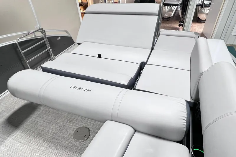 Slide: The Image of 2022 Harris FloteBote SOLTHICE 250 boat interior with luxurious seating arrangement. - 28