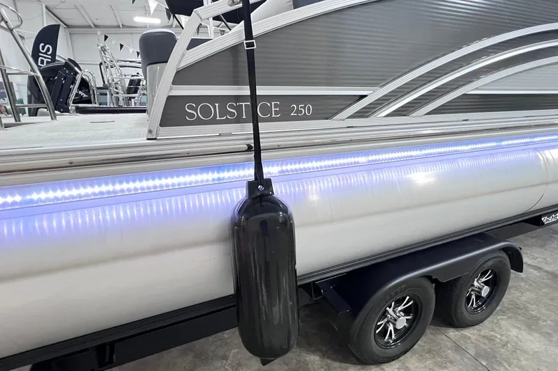 Slide: The Image of 2022 Harris FloteBote SOLTHICE 250 pontoon boat with LED lights and trailer. - 40