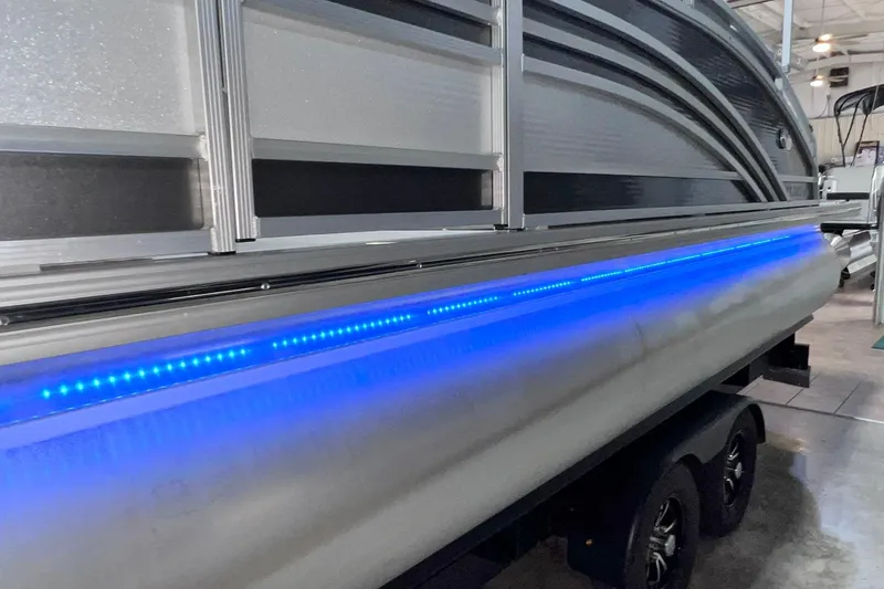 Slide: The Image of 2022 Harris FloteBote SOLTHICE 250 pontoon boat with blue LED lighting. - 47