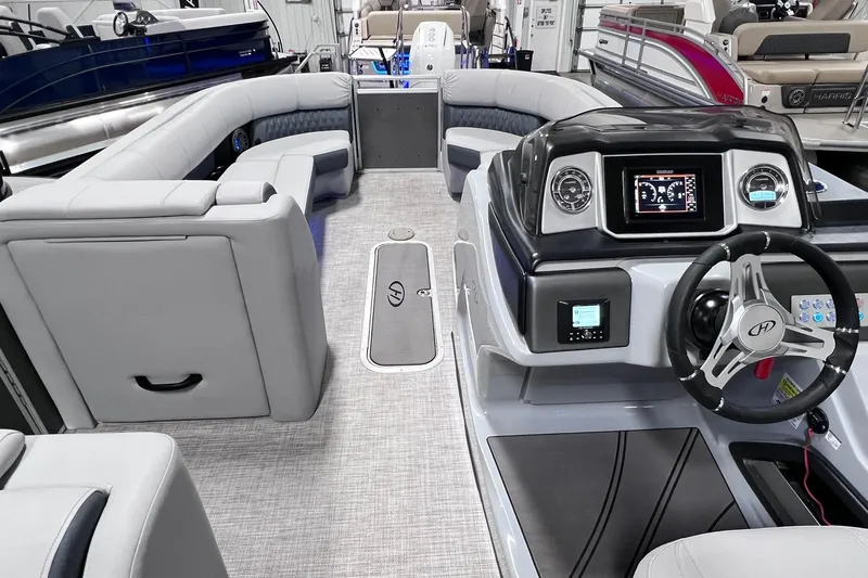 Slide: The Image of 2022 Harris FloteBote SOLTHICE 250 interior with modern dashboard and spacious seating. - 7
