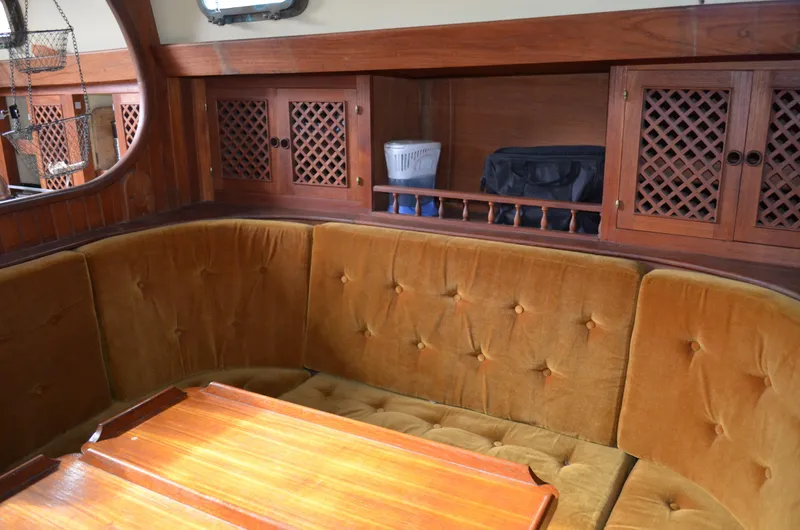 Slide: The Image of 1982 Young Sun Cutter interior with cushioned seating and wooden cabinetry. - 7