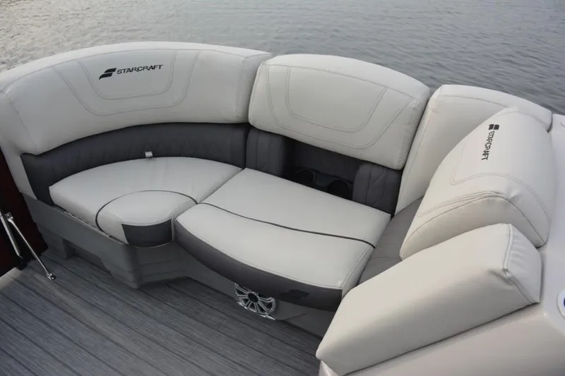 Slide: The Image of 2023 Starcraft SLS 1 boat interior seating with gray and white upholstery. - 17