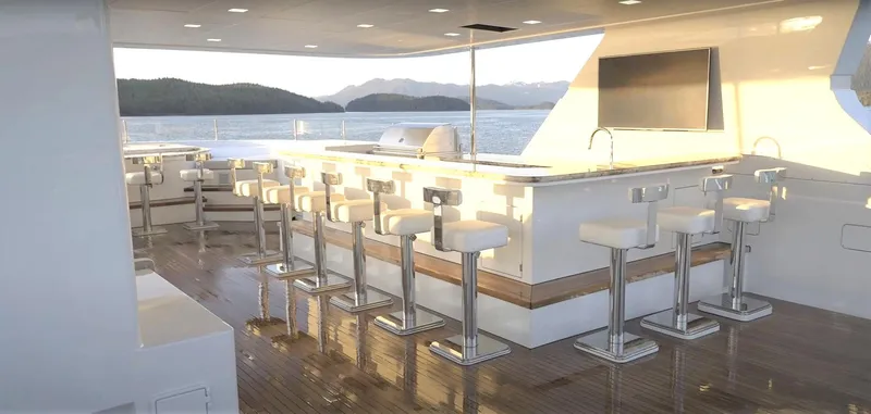 Slide: The Image of Luxury yacht bar area on Christensen Model Year 2020, with ocean view. - 17