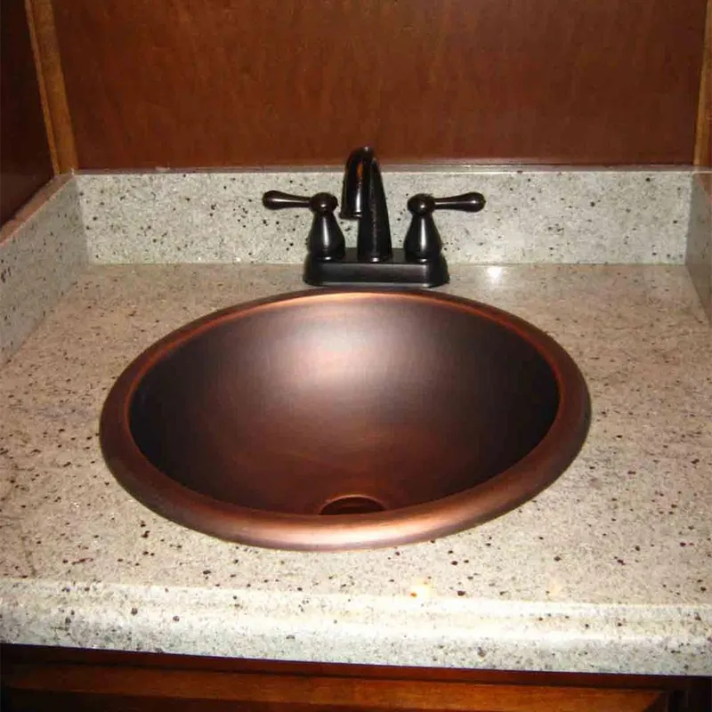 Slide: The Image of Copper sink with black faucet on speckled countertop in Bravada Dreamweaver Trip #16, 2011. - 12