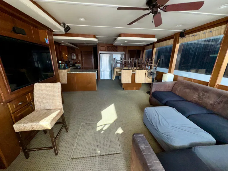 Slide: The Image of Spacious interior of 2011 Bravada Dreamweaver Trip #16 with modern furnishings and large windows. - 2