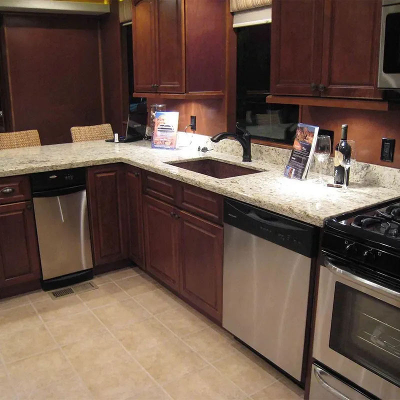 Slide: The Image of Modern kitchen in 2011 Bravada Dreamweaver Trip #16 with granite countertops and stainless steel appliances. - 5