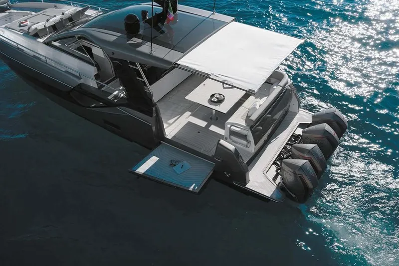 Slide: The Image of 2023 Azimut Verve 47 luxury yacht on the water with extended swim platform. - 10