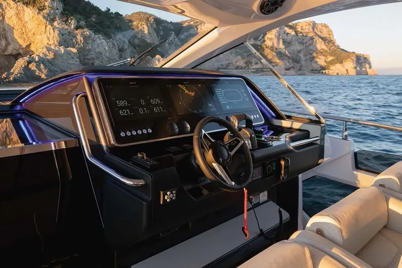 Slide: The Image of Helm of 2023 Azimut Verve 47 yacht with scenic ocean view. - 13