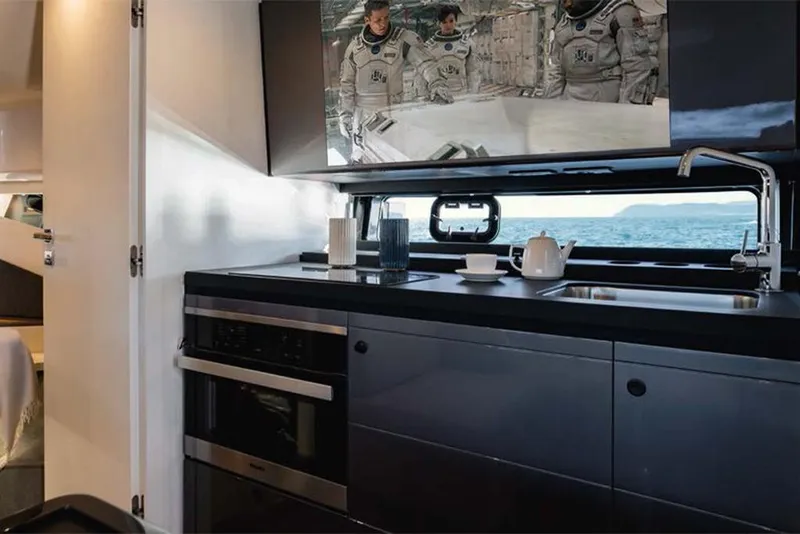 Slide: The Image of Modern kitchen interior of 2023 Azimut Verve 47 yacht with ocean view. - 18