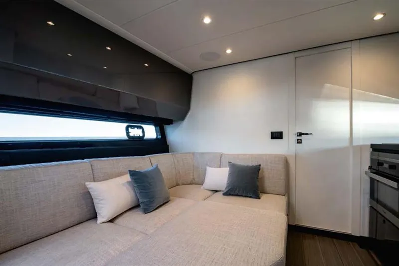 Slide: The Image of Interior of 2023 Azimut Verve 47 yacht with modern sofa and cushions. - 19