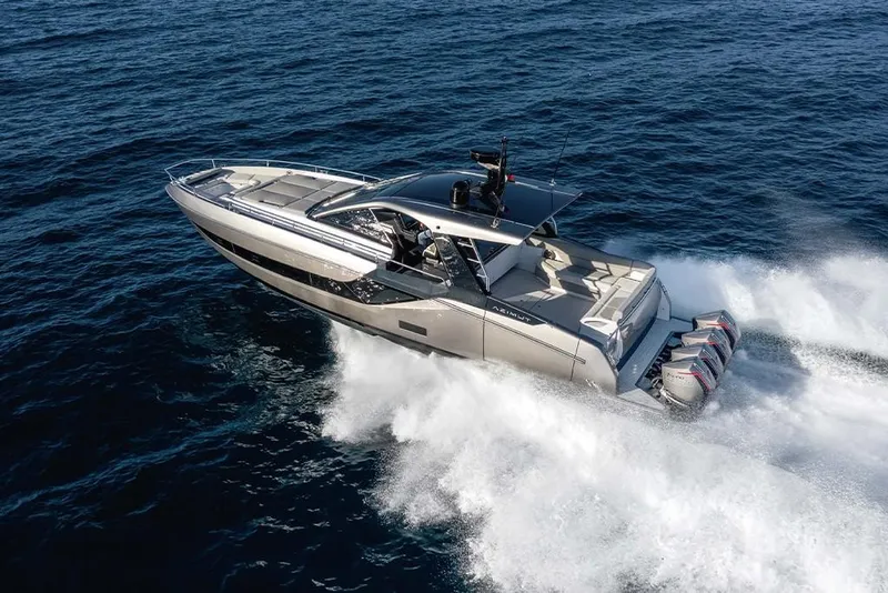 Slide: The Image of 2023 Azimut Verve 47 luxury yacht cruising on open water. - 2