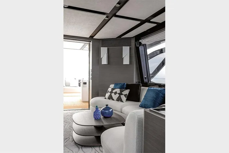 Slide: The Image of Luxurious interior of 2023 Azimut S8 yacht with modern decor and comfortable seating. - 12