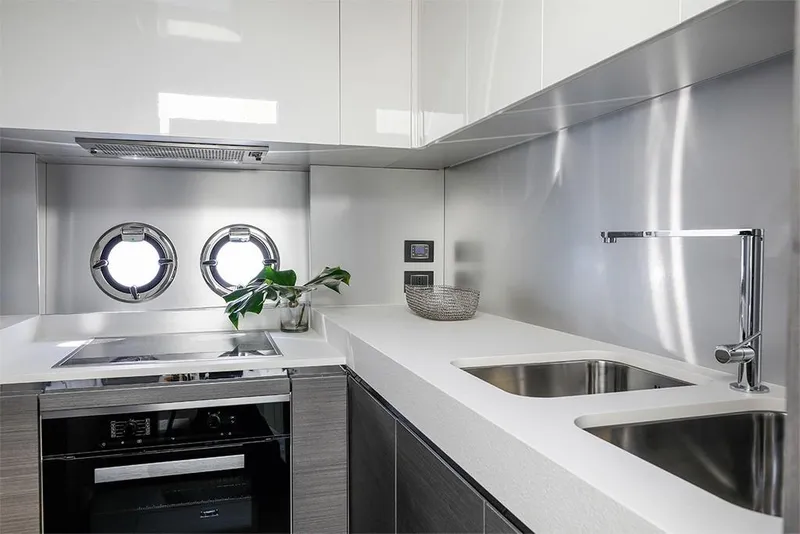 Slide: The Image of Modern kitchen in 2023 Azimut S8 yacht with sleek design and stainless steel appliances. - 13