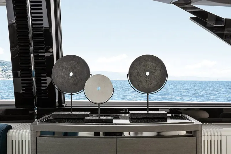 Slide: The Image of Decorative sculptures inside 2023 Azimut S8 yacht with ocean view. - 15