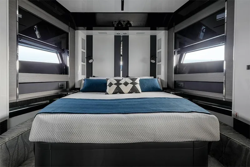 Slide: The Image of Luxurious bedroom interior of 2023 Azimut S8 yacht with modern design and large windows. - 17