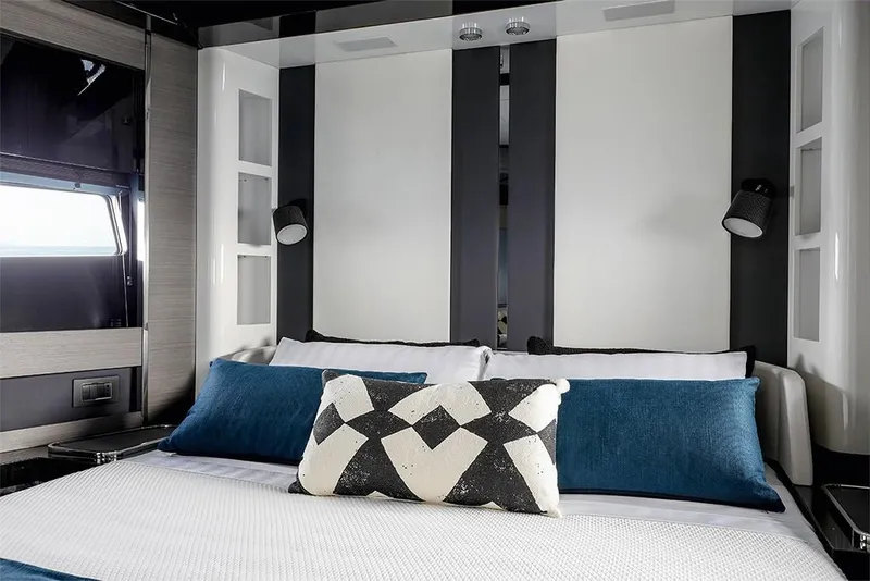 Slide: The Image of Luxurious bedroom interior of 2023 Azimut S8 yacht with modern decor. - 18