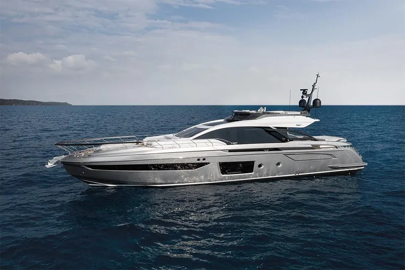 Slide: The Image of 2023 Azimut S8 luxury yacht cruising on open water. - 2