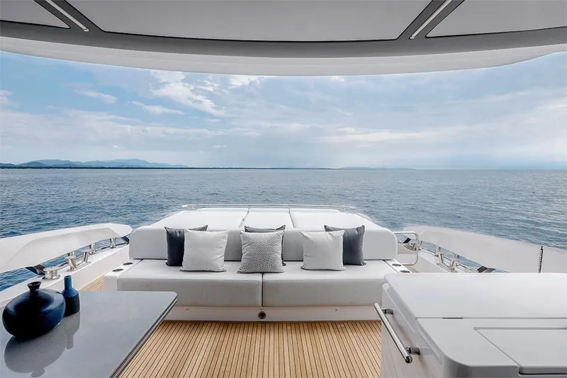 Slide: The Image of 2023 Azimut S8 yacht deck with ocean view and luxurious seating. - 7