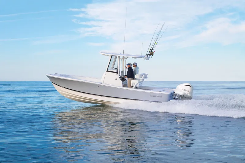 The Image of 2026 Regulator 24XO boat cruising on open water under clear skies. - 0