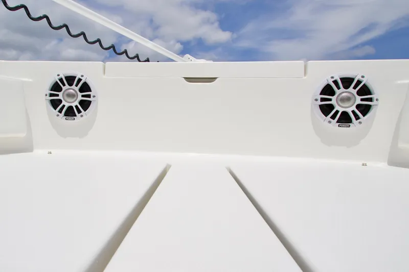 Slide: The Image of 2026 Regulator 24XO boat speakers against a clear blue sky. - 7