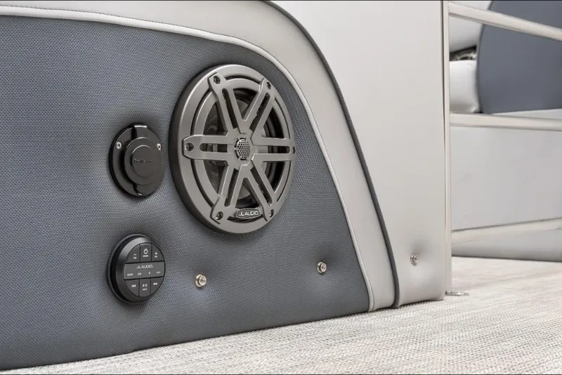 Slide: The Image of 2022 Harris Solstice 230 boat interior speaker and control panel. - 24