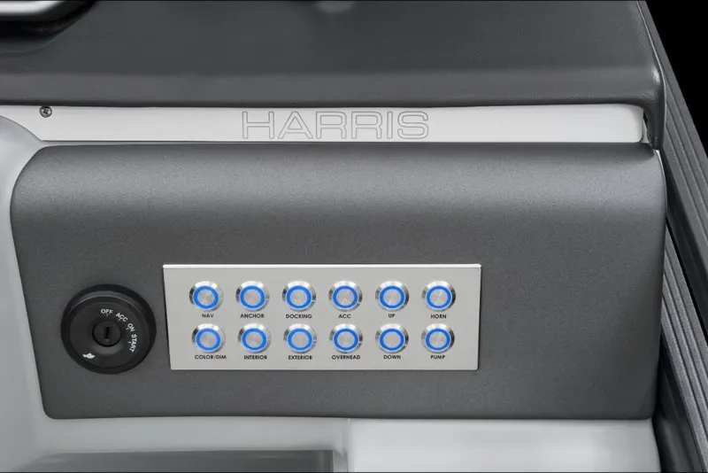 Slide: The Image of Control panel of a 2022 Harris Solstice 230 boat with labeled buttons. - 25