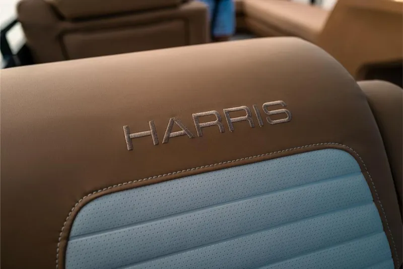 Slide: The Image of Close-up of 2023 Harris Solstice 250 boat seat with Harris logo. - 20