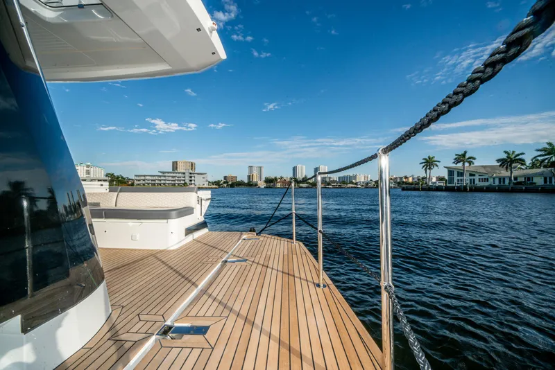 Slide: The Image of Galeon 400 Fly 2023 yacht deck with city skyline and waterfront view. - 37