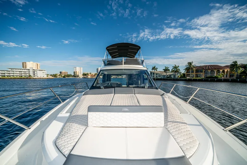 Slide: The Image of 2023 Galeon 400 Fly yacht on a sunny waterfront, showcasing luxury design and comfort. - 39