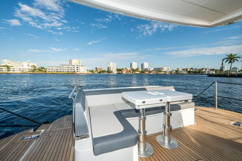 Slide: The Image of 2023 Galeon 400 Fly yacht deck with city skyline view. - 41