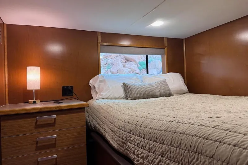 Slide: The Image of Cozy bedroom interior in 2015 Bravada Intrepid Share #10 with wooden decor and soft lighting. - 17