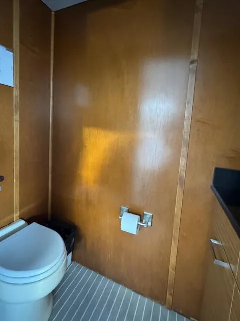 Slide: The Image of Modern bathroom with wooden paneling in a 2015 Bravada Intrepid Share #10. - 31