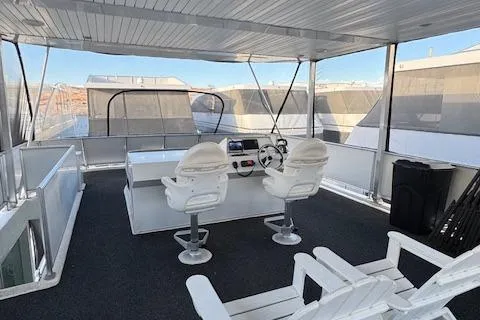 Slide: The Image of 2015 Bravada Intrepid Share #10 houseboat with spacious upper deck and modern helm. - 36