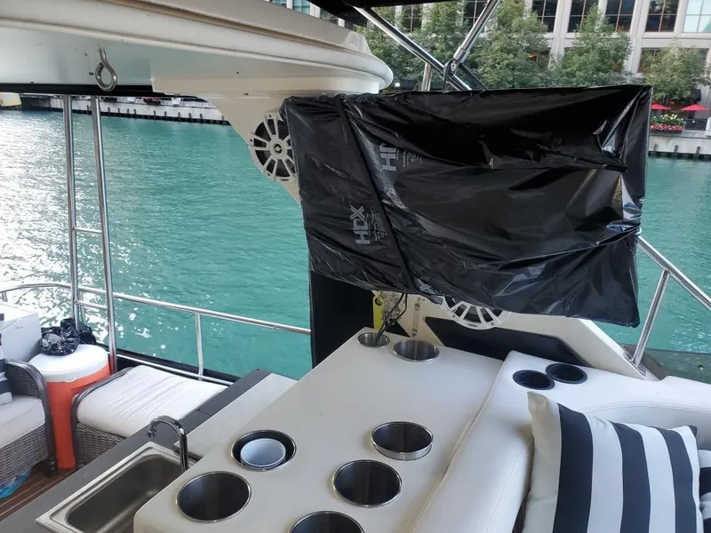 Slide: The Image of 1991 Cruisers Yachts 3850 Aft Cabin on a scenic waterway. - 14