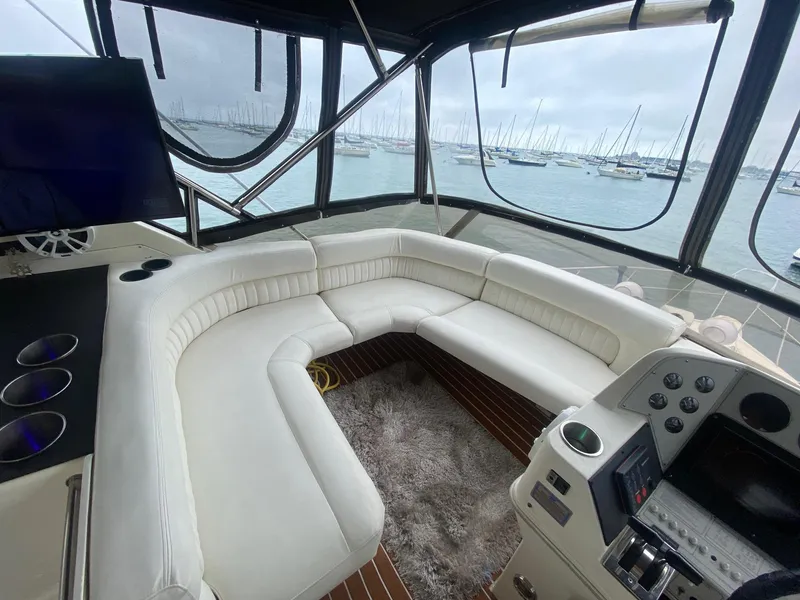 Slide: The Image of Interior of a 1991 Cruisers Yachts 3850 Aft Cabin with white sofa. - 22
