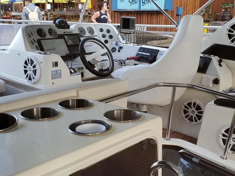 Slide: The Image of Interior view of 1991 Cruisers Yachts 3850 Aft Cabin, helm area. - 24