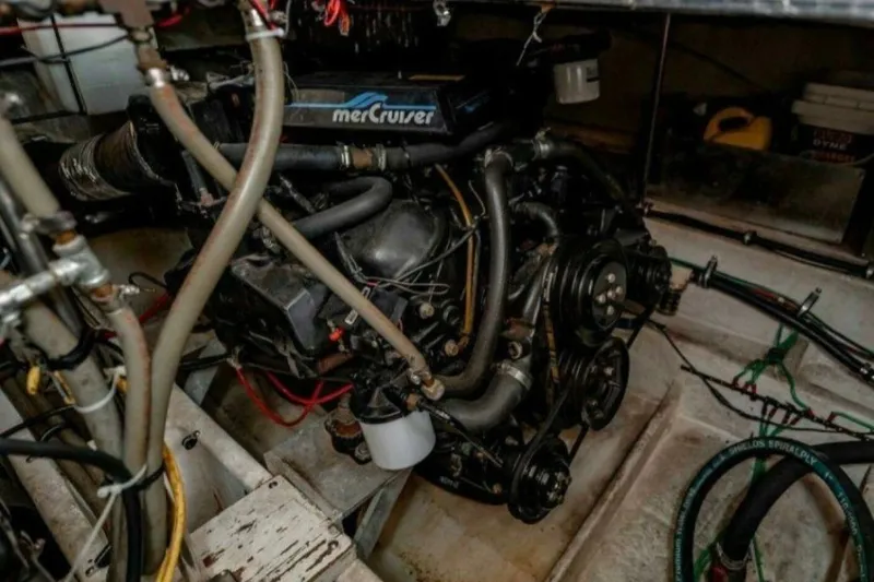 Slide: The Image of Engine room of 1991 Cruisers Yachts 3850 Aft Cabin with MerCruiser engine. - 33