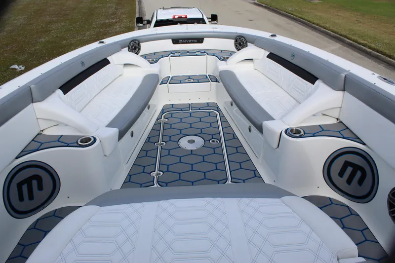 Slide: The Image of 2020 Mystic Powerboats M4200 interior with modern seating and stylish design. - 42