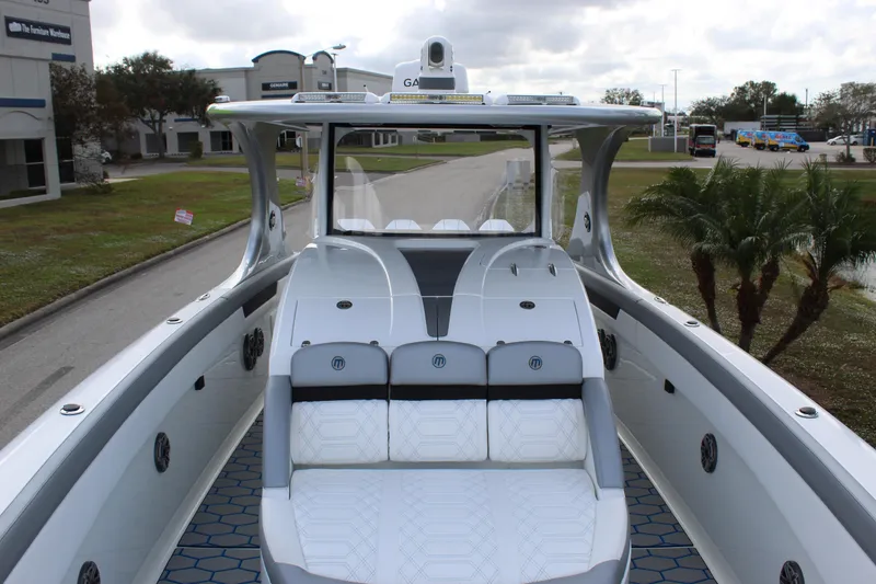 Slide: The Image of 2020 Mystic Powerboats M4200 with sleek design and luxurious seating on display. - 43